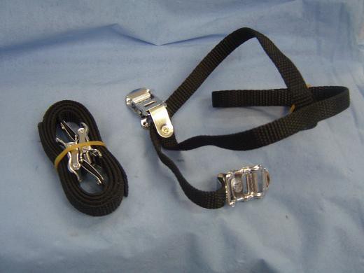 Pasek za nosilec ali pedala